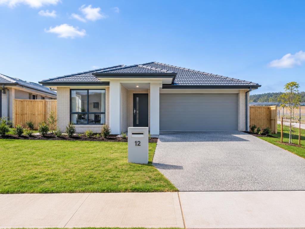 New turnkey house and land package home with driveway and fencing